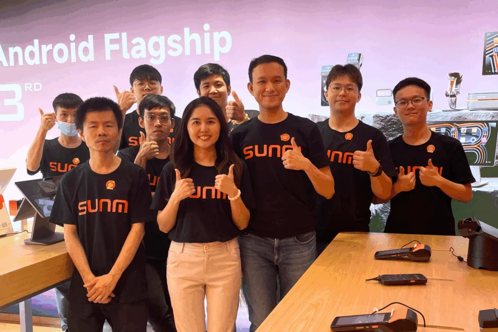 Mipos team at the Sunmi Home flagship opening — 'Android Flagship' backdrop