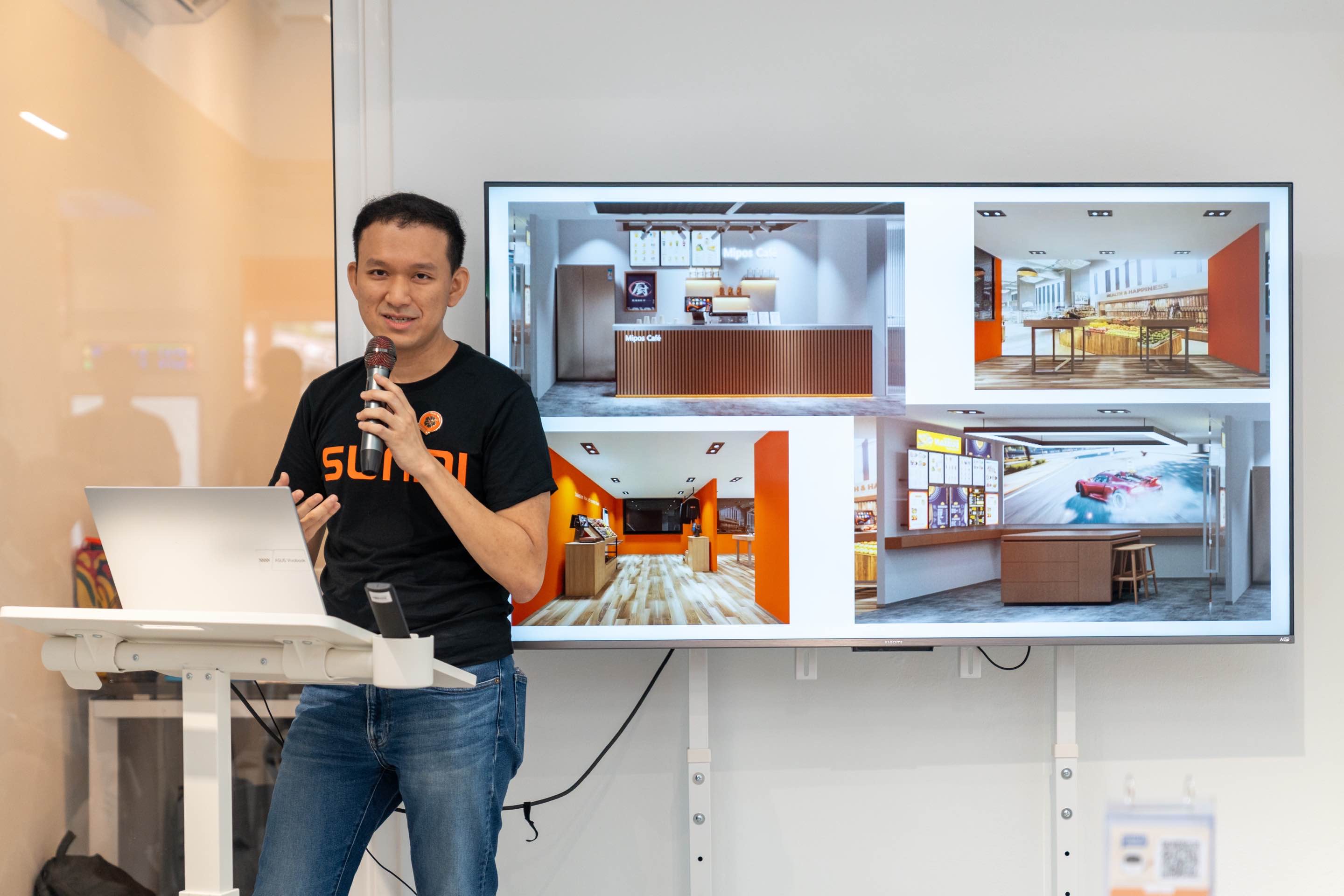 Mipos team members working together at the showroom